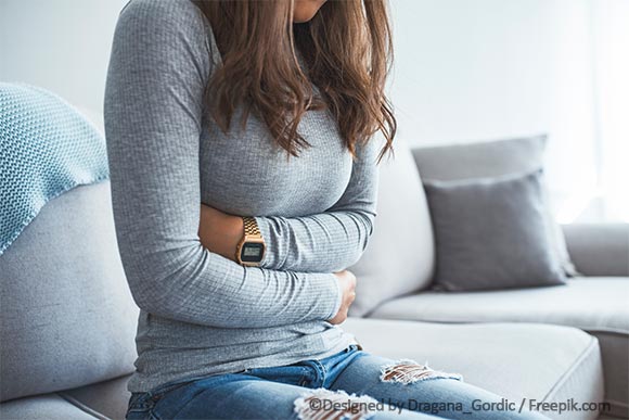 Kontraindikation für Spirale: Frau mit Menstruationsbeschwerden
